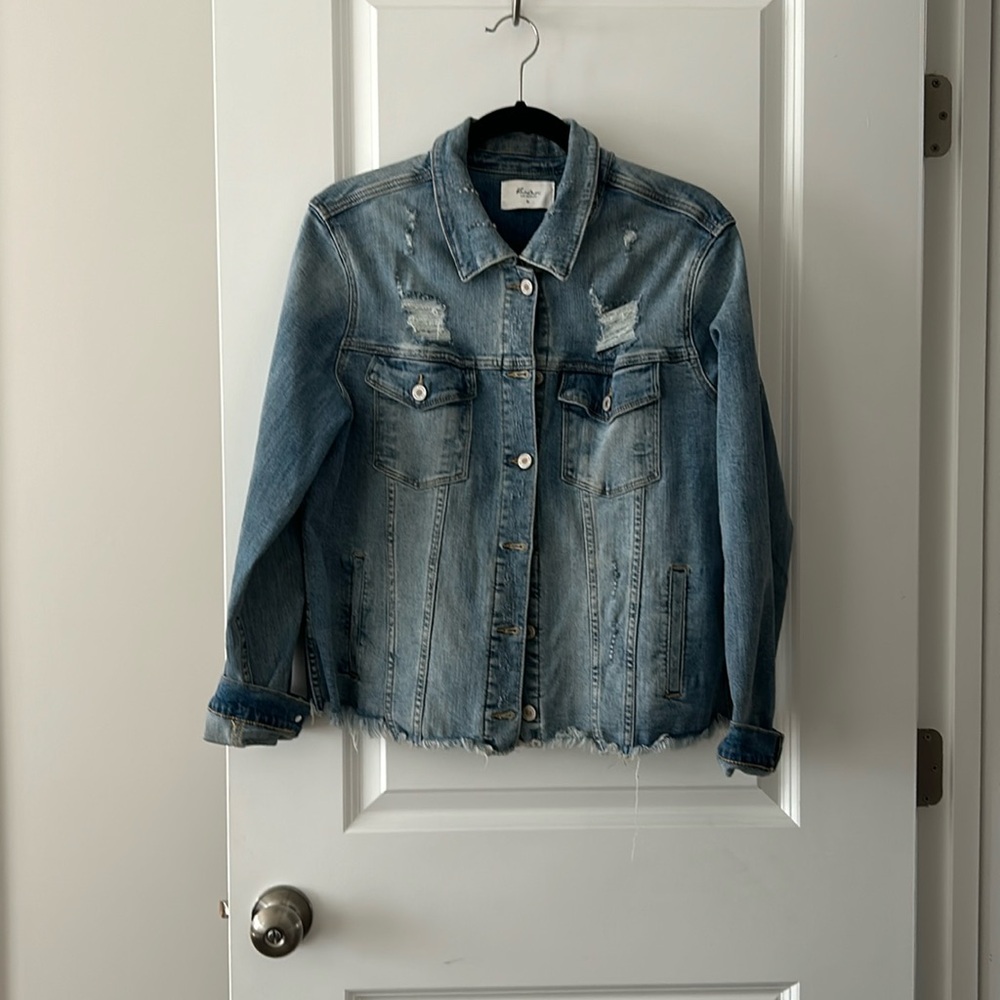 Distressed light blue jean jacket